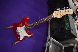 A Legacy electric guitar, Stratocaster shape, with gig bag