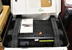 An Olive Music Server - basically a large hard drive for the pre streaming era but high end and