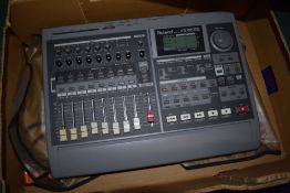 A Roland VS 880 EX digital 8 track recording workstation