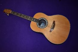 An Ovation Glen Campbell Legend guitar with Ovation case Model number 1617-4 serial number 207994