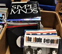 A selection of 45's with carrying case , mod , rock and more