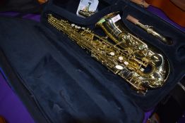 An Arnold and Sons alto saxophone, model ASA-110Y
