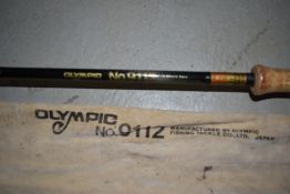 An Olympic 3.6 metre 3piece Graphite fishing rod No9112 with sleeve