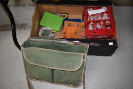 A large selection of tackle in many tins and boxes, including lures, spinners and a Canvas bag