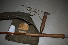 A 10ft split cane fly rod marked Millward Flyrover with original sleeve and spare tip