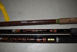 Three large fishing rods including two Chevron