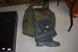 A pair of bib and brace quilted waders
