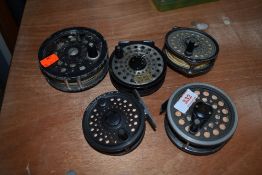 Five fly fishing reels with line, includes Intrepid, Shakespeare and Diawa