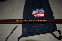 A Daiwa 14ft Spey Salmon Graphite coil rod with sleeve