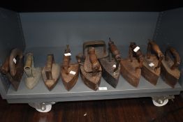 A good selection of antique flat stove and cast irons including Albatros