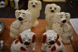 Three sets of staffordshire dogs.