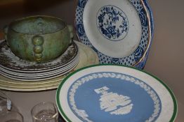 A selection of vintage plates, including two blue and white platters, Wedgwood,collectors plates and