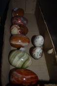 A collection of Onyx and similar decortative eggs.