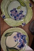 Three large platters, each bearing the name Carlton Ware to underside, with hand painted floral