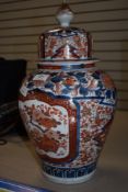 A large Chinese export hard paste lidded urn in Imari Palette 40cm hand decoarted with Moth,