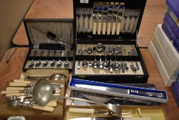 A mixed lot of vintage and some more modern cutlery, including silver plated cake slice, ladle,