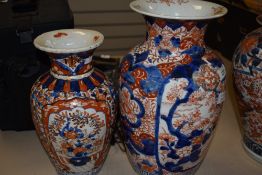 Two hard paste Chinese export vase in Imari palette both having floral decoration one having been