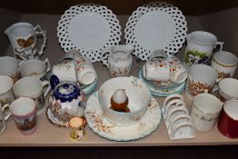 A varied lot of ceramics,a part tea service, souvenir items, tea pot,jugs,also items of royal