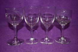 Two Victorian etched wine glasses, one with star and similar patters and the other ferns, also