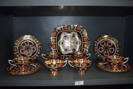 A Royal Crown Derby part tea service in excellent condition throughout comprising of six tea cups,