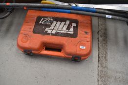 A cased hammer drill