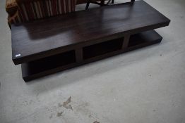 A modern dark stained TV stand or coffee table, approx. dimensions W160cm D52cm H32cm