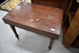 A Victorian mahogany rectangular commode/bidet, on turned legs makes a nice occasional table, approx