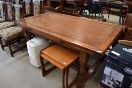 A top quality reproduction oak refectory style extending table, possibly Titchmarsh and Goodwin or