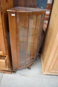 A mid 20th Century oak corner display cabinet, approx. height 115cm