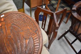 A folding carved table, mythical creature decoration, approx. diameter 60cm