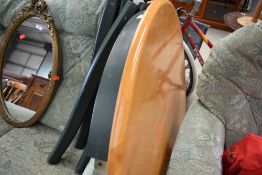 A modern wooden circular dining table, approx. diameter 105cm