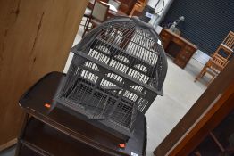 A reproduction ornamental bird cage
