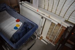 A vintage cot and pram etc
