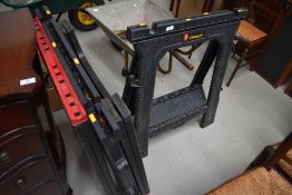 Four plastic trestles, including Stanley