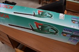 A Bosch AHS 48-16 hedge trimmer, boxed , looks to have had very little use