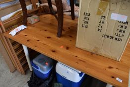 A modern pine top kitchen table having powder coated metal legs, approx. 120 x 80cm