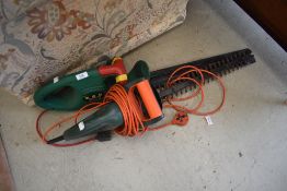 Two hedge trimmers