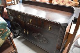 An early to mid 20th Century dark oak sideboard, approx. width 138cm