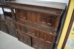 An 18th Century oak court cupboard, approx. dimensions W150cm D65cm H160cm