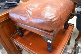 A modern leather square footstool on cabriole legs, approx. width 66cm