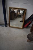A traditional gilt frame plaster wall mirror, approx. 73 x 55cm
