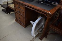 An Oriental hardwood style desk in the classical style, approx width 125cm depth 79cm