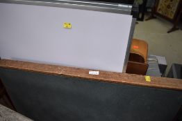 A traditional folding card table and a modern folding trestle table