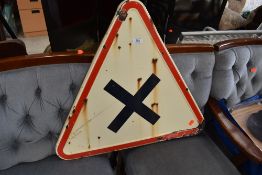 A vintage road or rail traingular warning sign, stamped on back, Jean Neuhaus s.a. 1972
