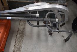 A vintage roofrack, and roof ladder attachments