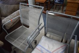 A pair of modern designer swivel chairs