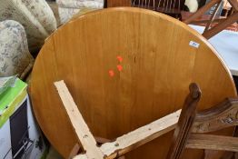 A modern light wood circular pedestal dining table, diameter approx. 108cm