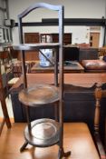 A traditional oak folding cake stand
