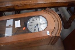 A vintage electro mechanical regulator clock, in mahogany and glazed case, dial named Inducta