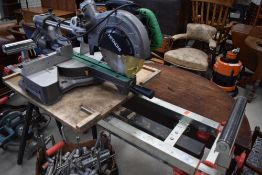 A roller style work bench and Hitachi mitre saw